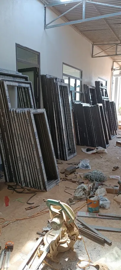 nhôm kính báu bùi - nha san xuât