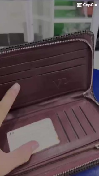 ví cầm tay nam nữ da cá sấu thật 100%...